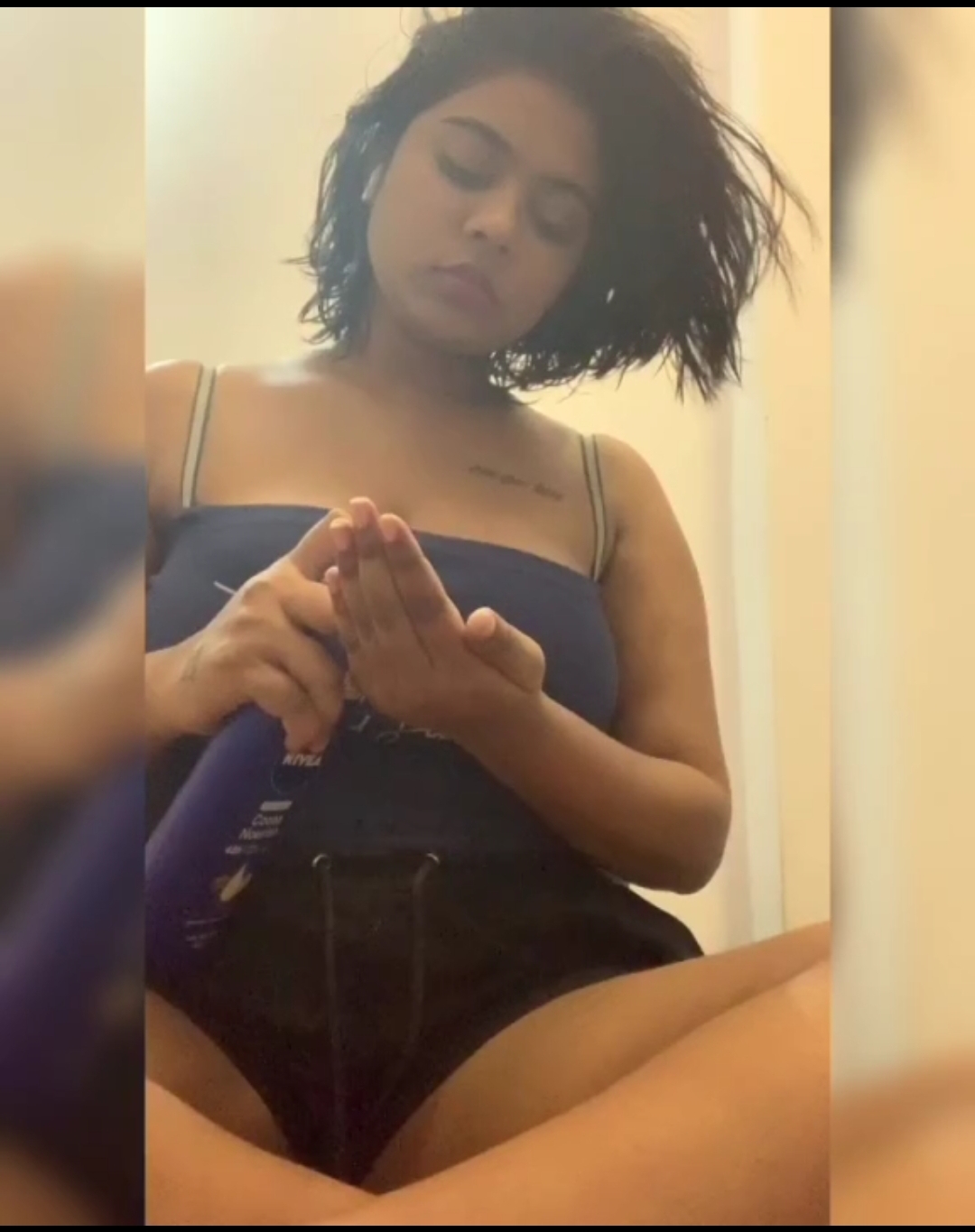 Cute girl rubbing pussy with lotion
